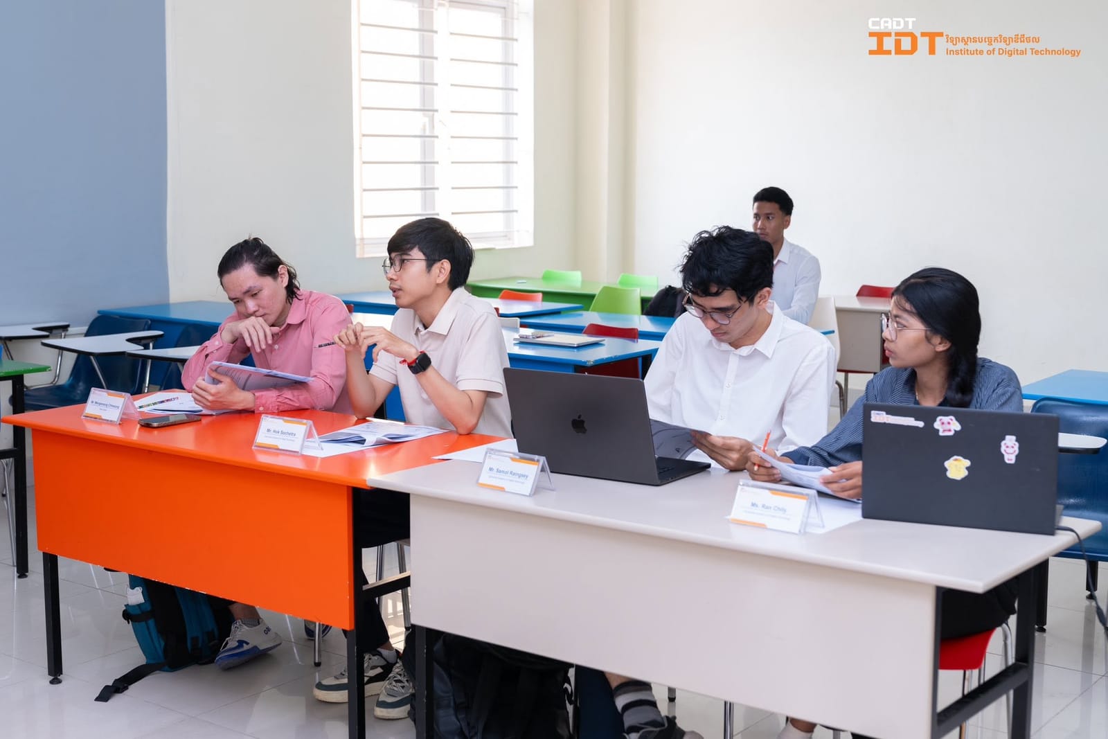 The jury panel reviewing a team's submission before their defense