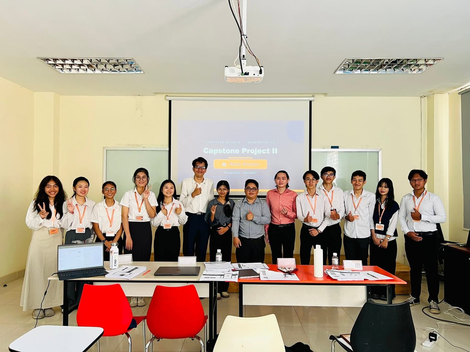 Group photo with the jury panel and Generation 10 students after the defenses